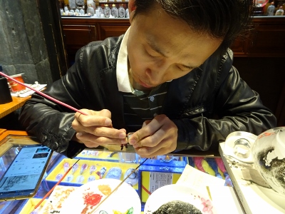 Glasmaler in der Old Street in Tunxi